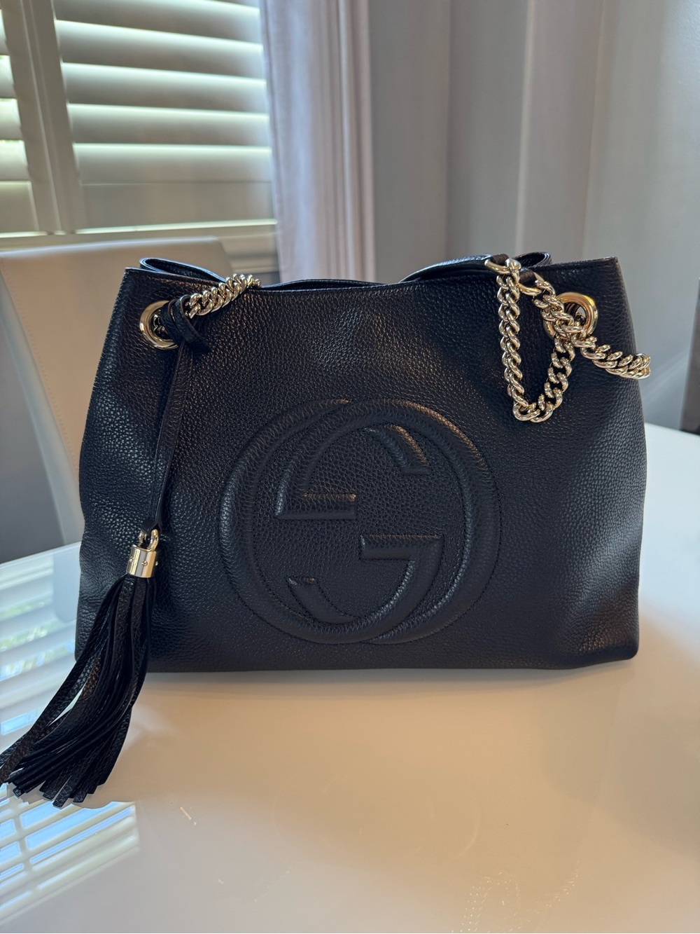 Gucci Black Pebbled Leather Shoulder Bag with Tassel and Gold Chain